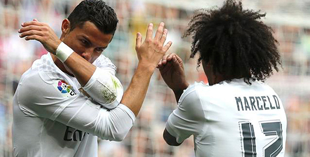 Marcelo y Cristiano celebran un gol