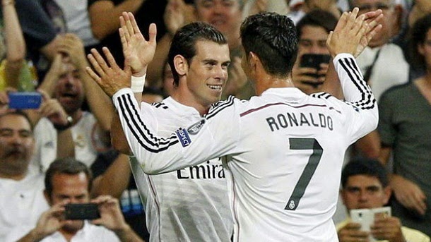 Bale y Cristiano Ronaldo celebran el 3-0 contra el Basilea