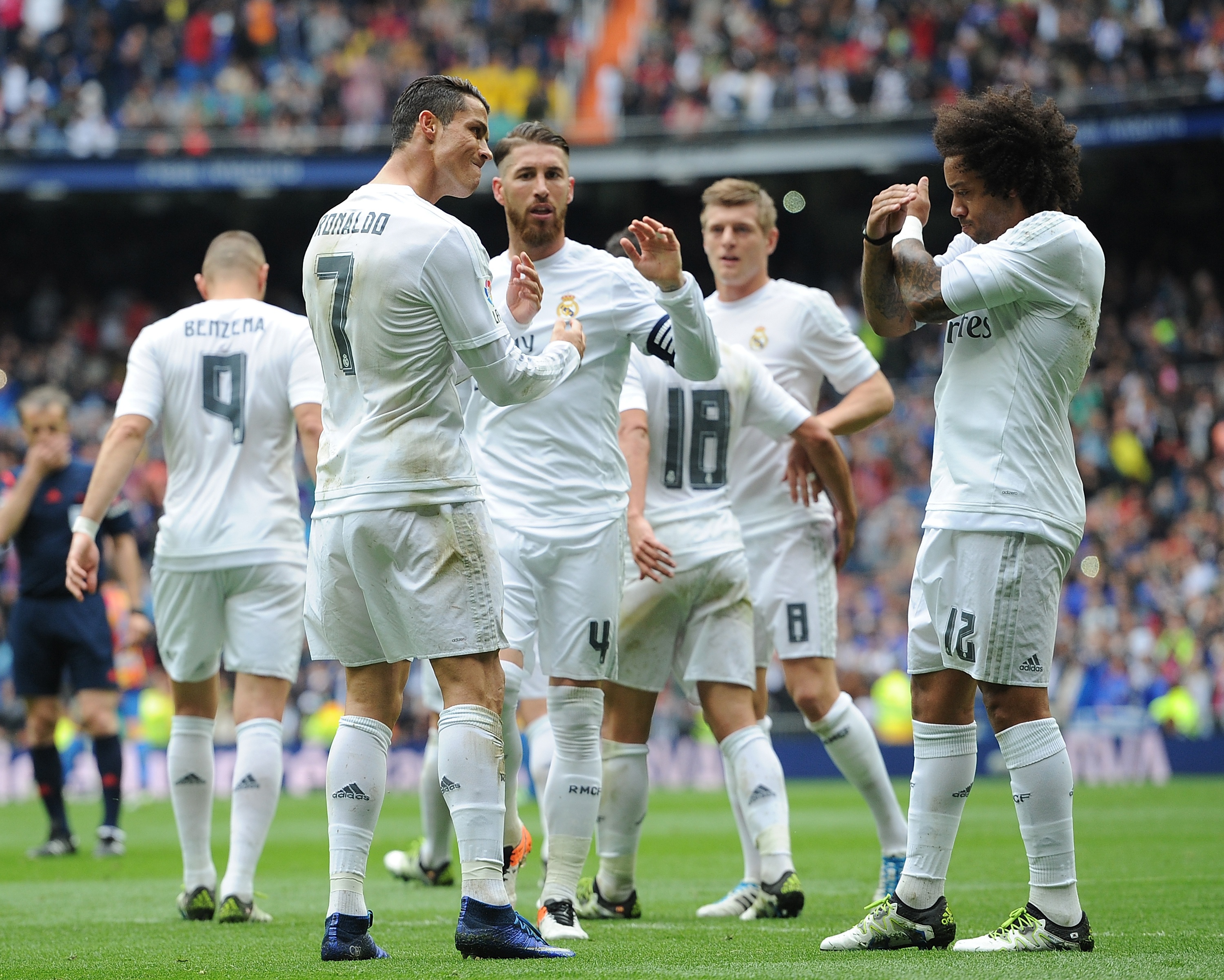Cristiano y Marcelo celebran un gol