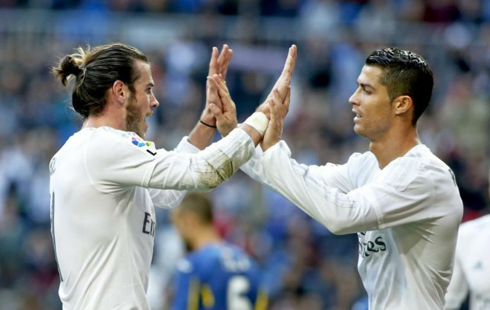 Cristiano celebra un gol con Gareth Bale