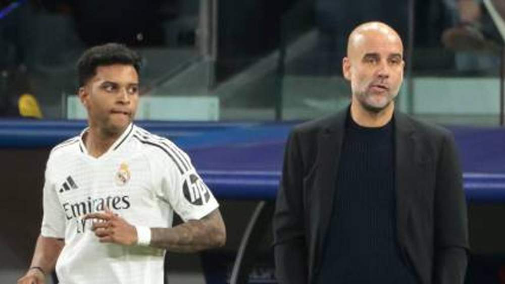Guardiola y Rodrygo Guardiola y Rodrygo