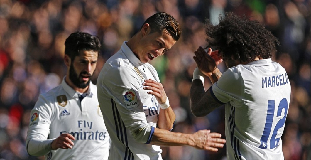Cristiano y Marcelo celebran uno de los goles al Granada
