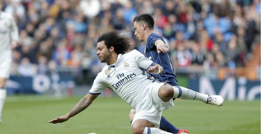 Marcelo cae en el partido ante el Málaga